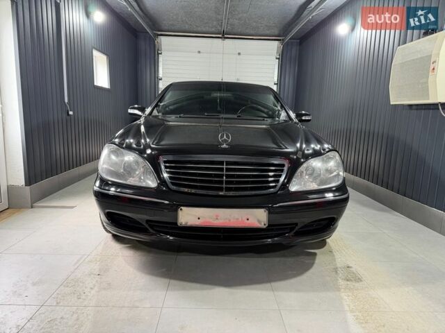 Черный Мерседес С Класс, объемом двигателя 6.3 л и пробегом 115 тыс. км за 33000 $, фото 1 на Automoto.ua