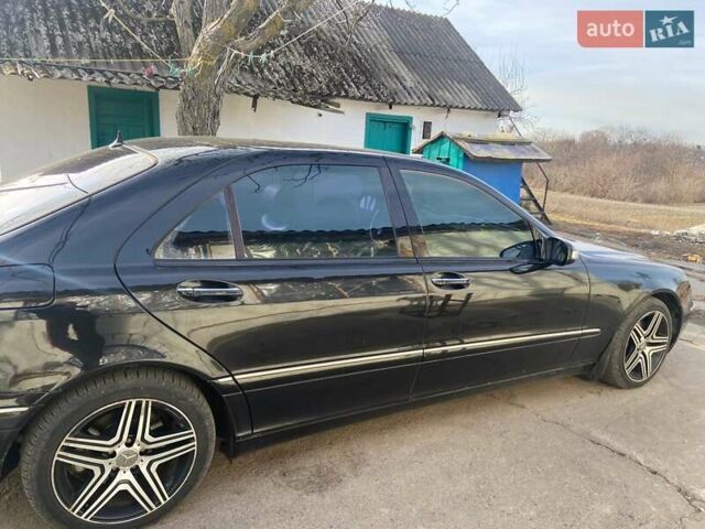 Черный Мерседес С Класс, объемом двигателя 5 л и пробегом 350 тыс. км за 7000 $, фото 1 на Automoto.ua
