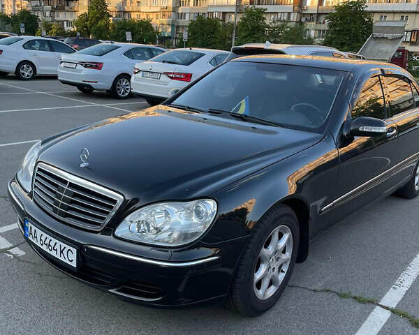 Черный Мерседес С Класс, объемом двигателя 4.97 л и пробегом 327 тыс. км за 14000 $, фото 1 на Automoto.ua