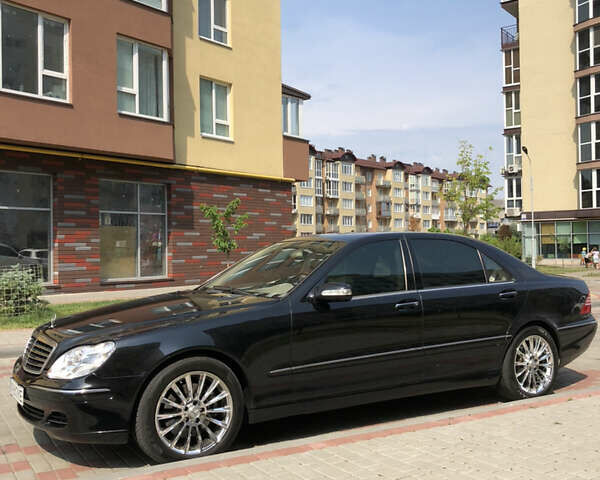 Черный Мерседес С Класс, объемом двигателя 5 л и пробегом 290 тыс. км за 8000 $, фото 1 на Automoto.ua