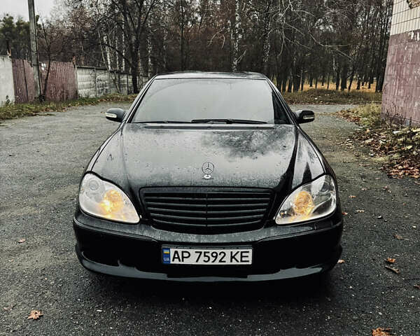 Черный Мерседес С Класс, объемом двигателя 4.97 л и пробегом 266 тыс. км за 9500 $, фото 1 на Automoto.ua