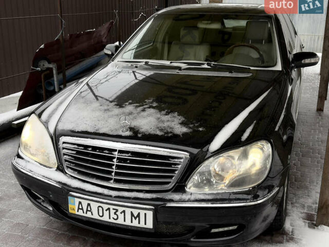 Черный Мерседес С Класс, объемом двигателя 4.97 л и пробегом 380 тыс. км за 4500 $, фото 1 на Automoto.ua