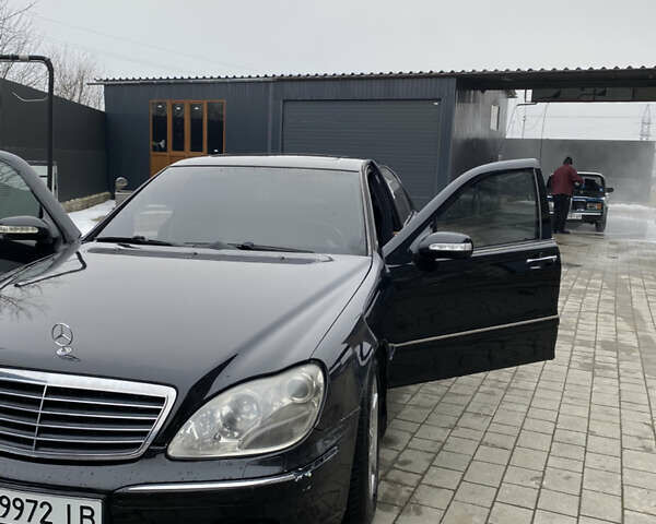 Черный Мерседес С Класс, объемом двигателя 5 л и пробегом 391 тыс. км за 9800 $, фото 1 на Automoto.ua