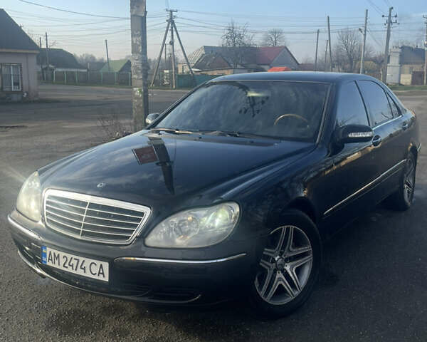 Черный Мерседес С Класс, объемом двигателя 3.72 л и пробегом 313 тыс. км за 4900 $, фото 1 на Automoto.ua
