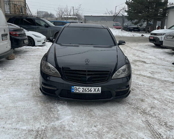 Чорний Мерседес С Клас, об'ємом двигуна 5.46 л та пробігом 268 тис. км за 9500 $, фото 1 на Automoto.ua