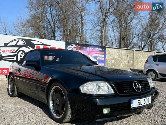 Черный Мерседес СЛ-Класс, объемом двигателя 4.97 л и пробегом 187 тыс. км за 49000 $, фото 1 на Automoto.ua