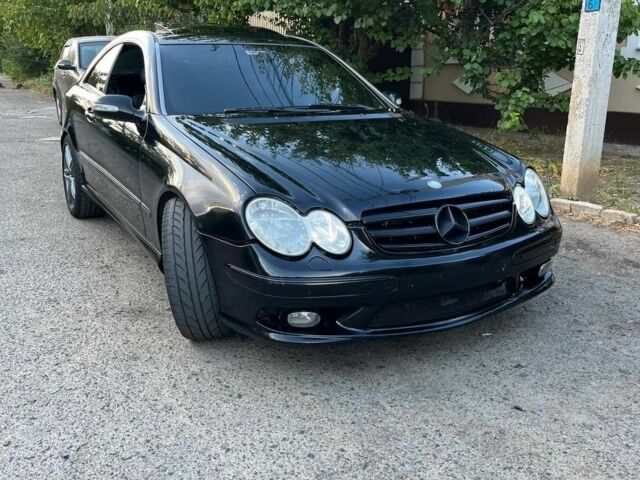 Черный Мерседес CLK-Class, объемом двигателя 5 л и пробегом 128 тыс. км за 5200 $, фото 1 на Automoto.ua