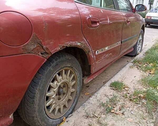 Червоний Меркурі Mystique, об'ємом двигуна 3 л та пробігом 320 тис. км за 1500 $, фото 1 на Automoto.ua