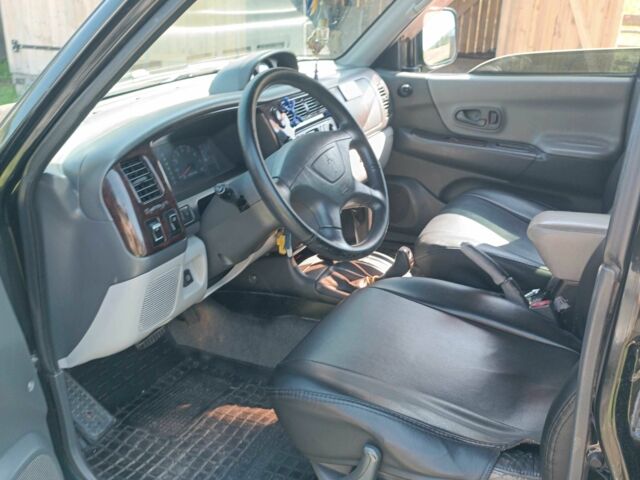 Чорний Міцубісі 500, об'ємом двигуна 3 л та пробігом 280 тис. км за 9000 $, фото 1 на Automoto.ua