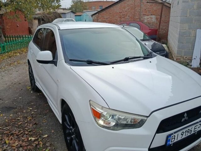Белый Мицубиси АСХ, объемом двигателя 2 л и пробегом 171 тыс. км за 11539 $, фото 1 на Automoto.ua