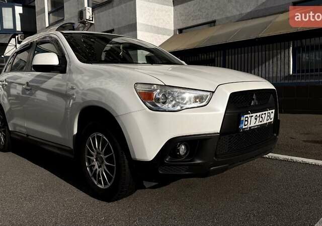 Белый Мицубиси АСХ, объемом двигателя 1.6 л и пробегом 165 тыс. км за 8700 $, фото 1 на Automoto.ua