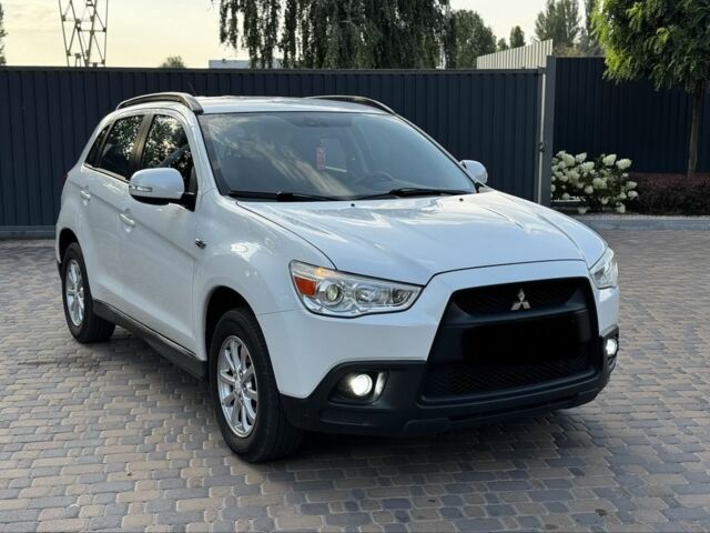 Белый Мицубиси АСХ, объемом двигателя 1.8 л и пробегом 206 тыс. км за 8800 $, фото 1 на Automoto.ua