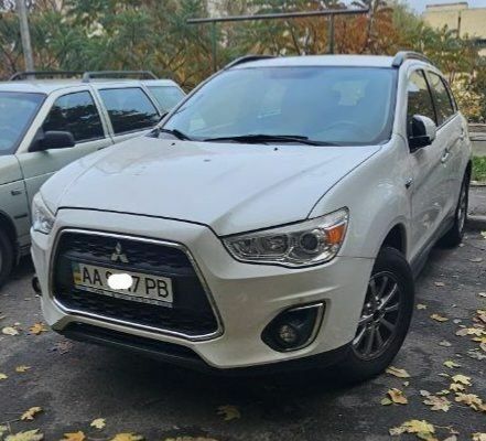 Белый Мицубиси АСХ, объемом двигателя 1.8 л и пробегом 166 тыс. км за 8500 $, фото 1 на Automoto.ua
