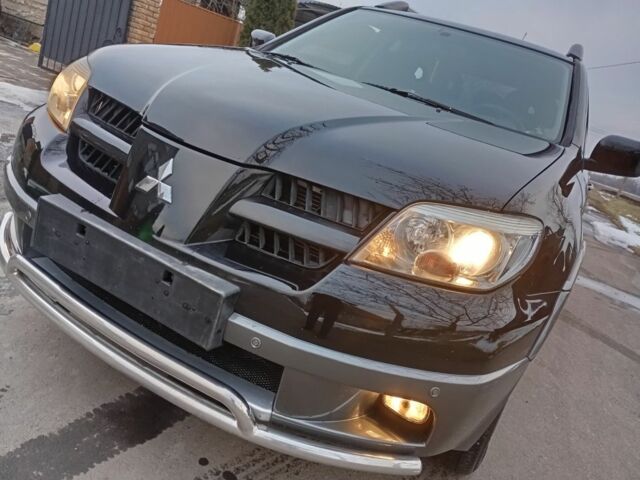 Черный Мицубиси АСХ, объемом двигателя 0 л и пробегом 148 тыс. км за 6800 $, фото 1 на Automoto.ua