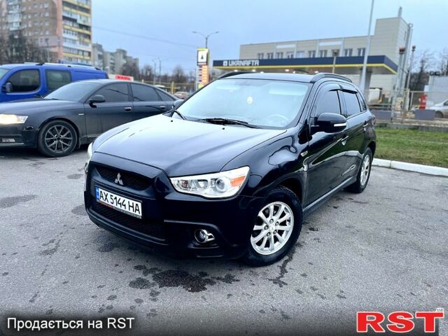 Черный Мицубиси АСХ, объемом двигателя 1.8 л и пробегом 157 тыс. км за 9850 $, фото 1 на Automoto.ua