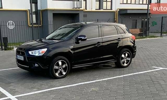 Черный Мицубиси АСХ, объемом двигателя 1.8 л и пробегом 283 тыс. км за 10500 $, фото 1 на Automoto.ua