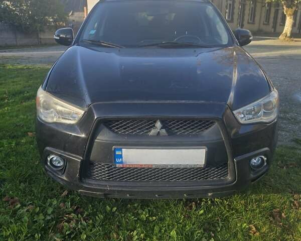 Черный Мицубиси АСХ, объемом двигателя 1.8 л и пробегом 152 тыс. км за 7500 $, фото 1 на Automoto.ua