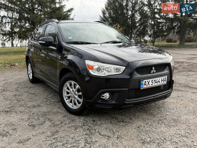 Черный Мицубиси АСХ, объемом двигателя 1.8 л и пробегом 150 тыс. км за 7800 $, фото 1 на Automoto.ua