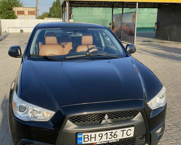 Черный Мицубиси АСХ, объемом двигателя 1.59 л и пробегом 188 тыс. км за 8800 $, фото 1 на Automoto.ua