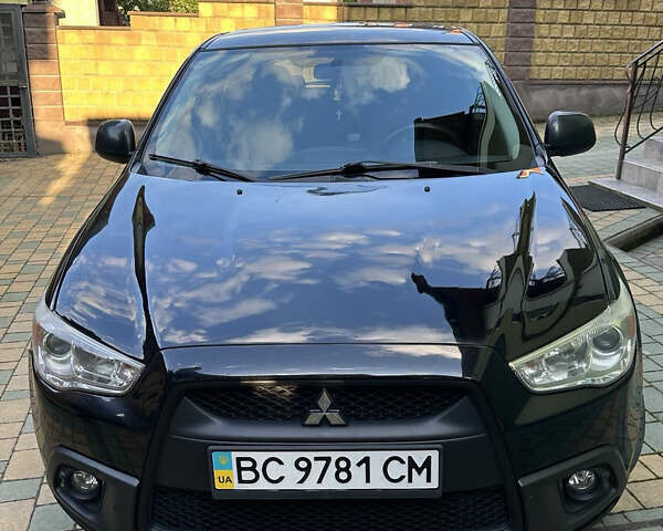 Черный Мицубиси АСХ, объемом двигателя 1.8 л и пробегом 214 тыс. км за 9900 $, фото 1 на Automoto.ua