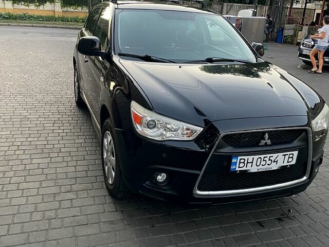 Черный Мицубиси АСХ, объемом двигателя 1.8 л и пробегом 210 тыс. км за 8700 $, фото 1 на Automoto.ua