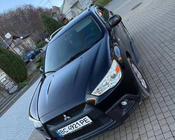 Черный Мицубиси АСХ, объемом двигателя 1.59 л и пробегом 237 тыс. км за 8900 $, фото 1 на Automoto.ua