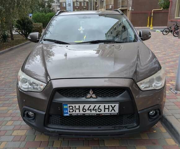 Коричневий Міцубісі АСХ, об'ємом двигуна 1.8 л та пробігом 162 тис. км за 8500 $, фото 1 на Automoto.ua