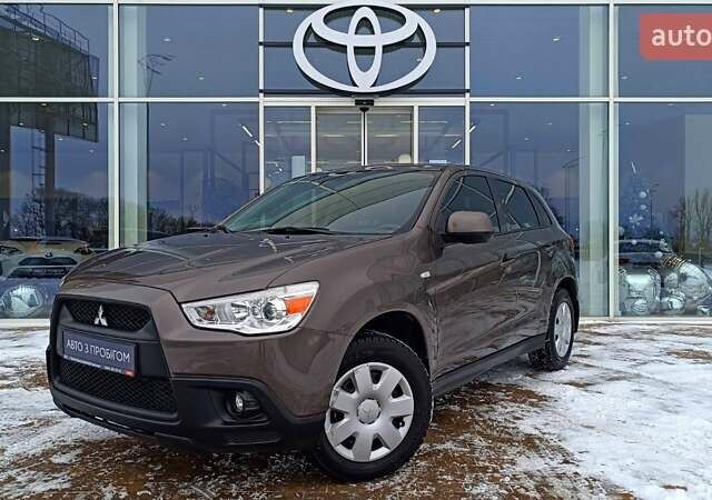 Коричневый Мицубиси АСХ, объемом двигателя 1.8 л и пробегом 136 тыс. км за 10608 $, фото 1 на Automoto.ua