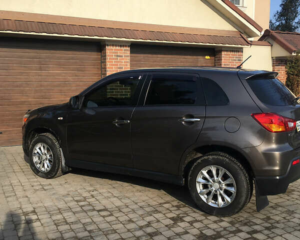 Коричневый Мицубиси АСХ, объемом двигателя 1.8 л и пробегом 112 тыс. км за 9200 $, фото 1 на Automoto.ua