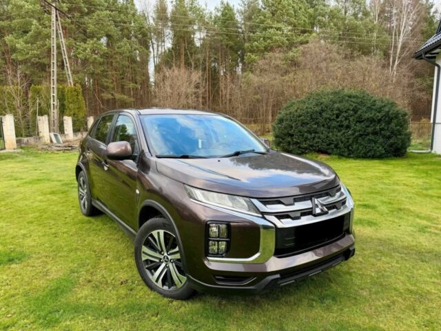 Коричневый Мицубиси АСХ, объемом двигателя 2 л и пробегом 55 тыс. км за 14800 $, фото 1 на Automoto.ua