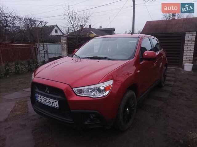 Красный Мицубиси АСХ, объемом двигателя 1.59 л и пробегом 171 тыс. км за 8850 $, фото 1 на Automoto.ua