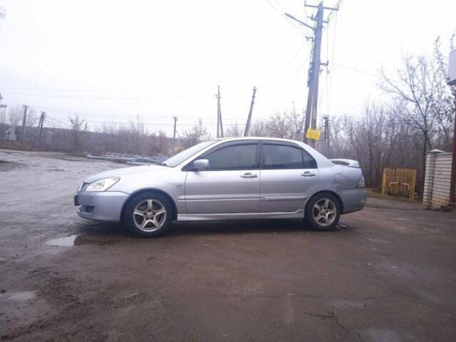 Серый Мицубиси АСХ, объемом двигателя 2 л и пробегом 222 тыс. км за 2850 $, фото 1 на Automoto.ua