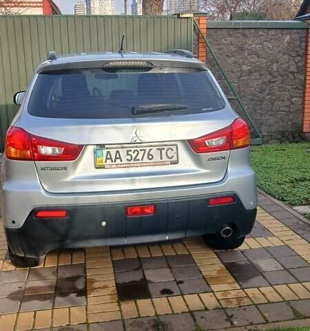 Серый Мицубиси АСХ, объемом двигателя 2 л и пробегом 142 тыс. км за 11000 $, фото 1 на Automoto.ua