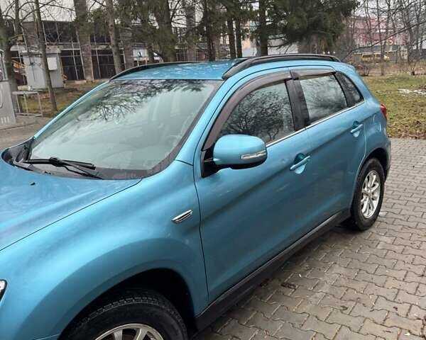 Синий Мицубиси АСХ, объемом двигателя 2 л и пробегом 157 тыс. км за 11400 $, фото 1 на Automoto.ua