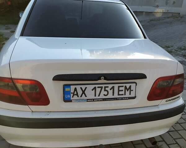 Белый Мицубиси Харизма, объемом двигателя 1.6 л и пробегом 247 тыс. км за 2800 $, фото 1 на Automoto.ua