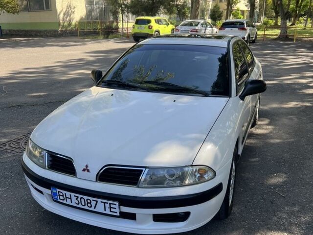 Білий Міцубісі Харизма, об'ємом двигуна 1.8 л та пробігом 276 тис. км за 2999 $, фото 1 на Automoto.ua