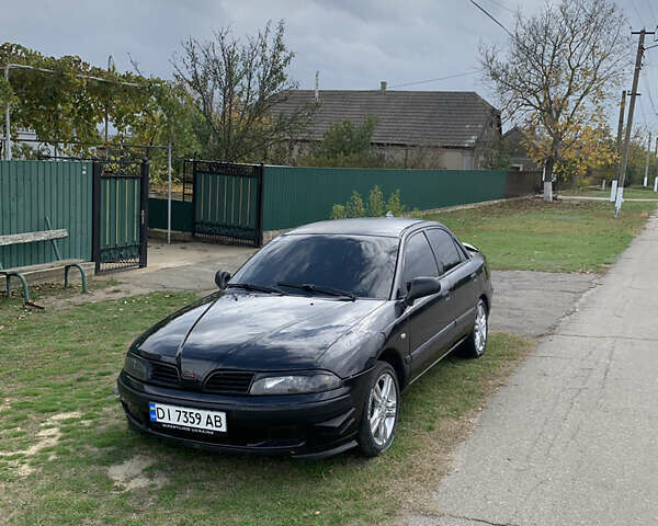 Міцубісі Харизма 2002 у Измаиле на Automoto.ua Чорний Міцубісі Харизма, об'ємом двигуна 1.6 л та пробігом 500 тис. км за 2600 $, фото 1 на Automoto.ua