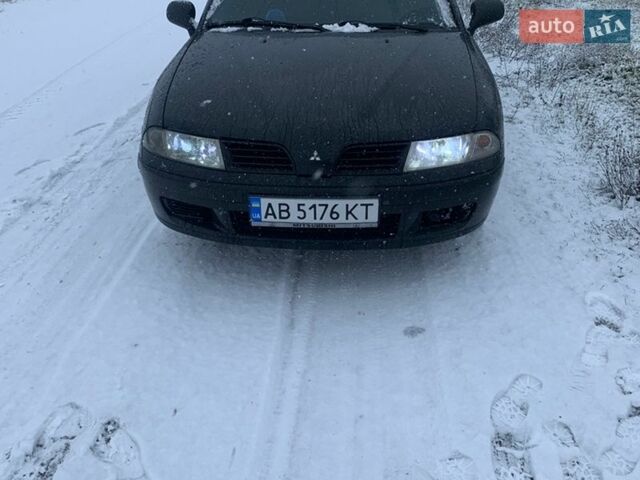 Чорний Міцубісі Харизма, об'ємом двигуна 1.6 л та пробігом 283 тис. км за 3200 $, фото 1 на Automoto.ua