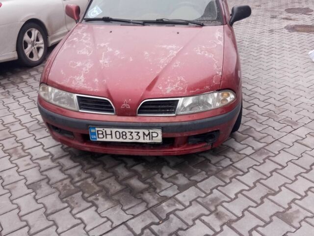Красный Мицубиси Харизма, объемом двигателя 1.6 л и пробегом 2 тыс. км за 1900 $, фото 1 на Automoto.ua