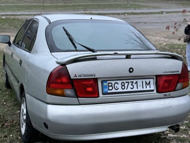 Серый Мицубиси Харизма, объемом двигателя 1.6 л и пробегом 340 тыс. км за 2000 $, фото 1 на Automoto.ua