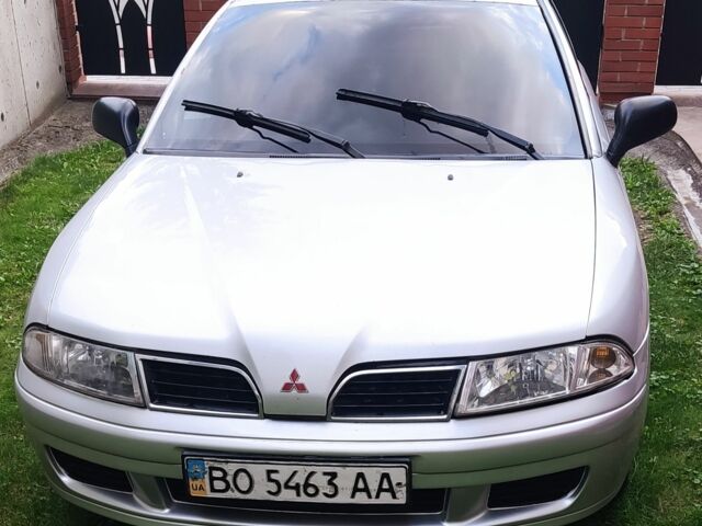 Сірий Міцубісі Харизма, об'ємом двигуна 1.9 л та пробігом 183 тис. км за 2500 $, фото 1 на Automoto.ua