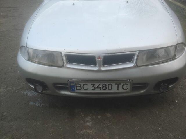 Серый Мицубиси Харизма, объемом двигателя 1.9 л и пробегом 280 тыс. км за 1200 $, фото 1 на Automoto.ua