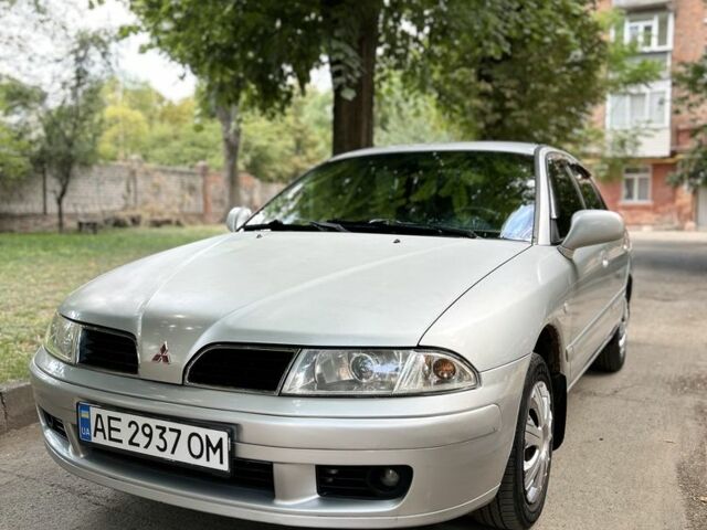 Серый Мицубиси Харизма, объемом двигателя 1.6 л и пробегом 270 тыс. км за 2911 $, фото 1 на Automoto.ua