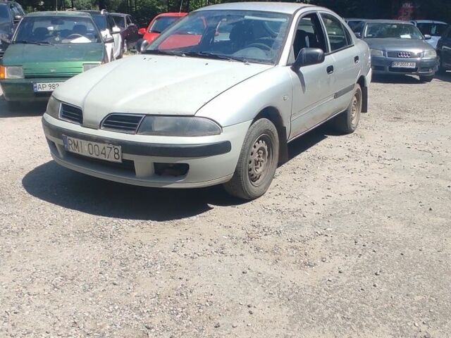 Сірий Міцубісі Харизма, об'ємом двигуна 1.9 л та пробігом 250 тис. км за 800 $, фото 1 на Automoto.ua