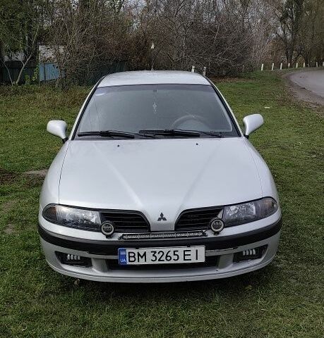 Серый Мицубиси Харизма, объемом двигателя 1.6 л и пробегом 250 тыс. км за 2600 $, фото 1 на Automoto.ua