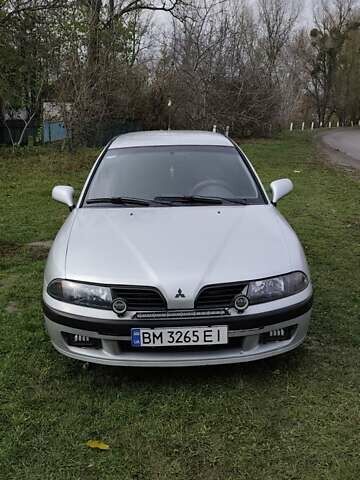 Серый Мицубиси Харизма, объемом двигателя 1.6 л и пробегом 250 тыс. км за 2600 $, фото 1 на Automoto.ua