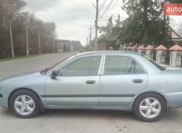 Сірий Міцубісі Харизма, об'ємом двигуна 1.6 л та пробігом 275 тис. км за 2450 $, фото 1 на Automoto.ua