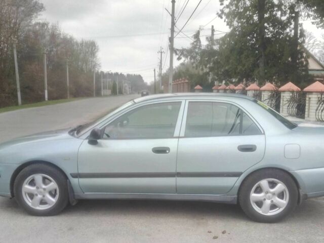 Сірий Міцубісі Харизма, об'ємом двигуна 0 л та пробігом 275 тис. км за 2309 $, фото 1 на Automoto.ua