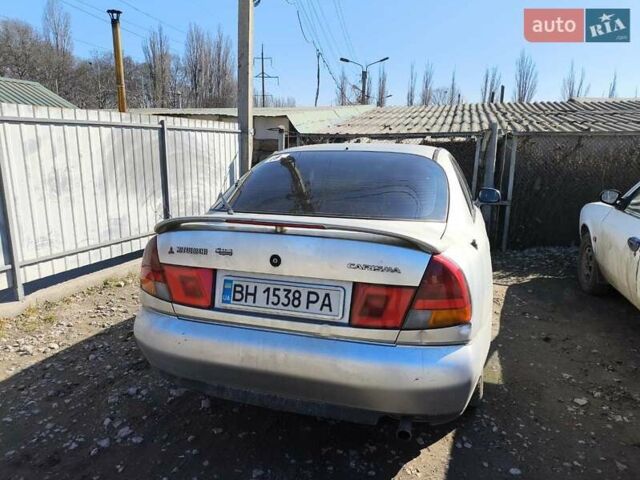 Сірий Міцубісі Харизма, об'ємом двигуна 1.8 л та пробігом 300 тис. км за 1800 $, фото 1 на Automoto.ua