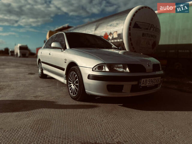 Сірий Міцубісі Харизма, об'ємом двигуна 1.83 л та пробігом 258 тис. км за 4200 $, фото 1 на Automoto.ua